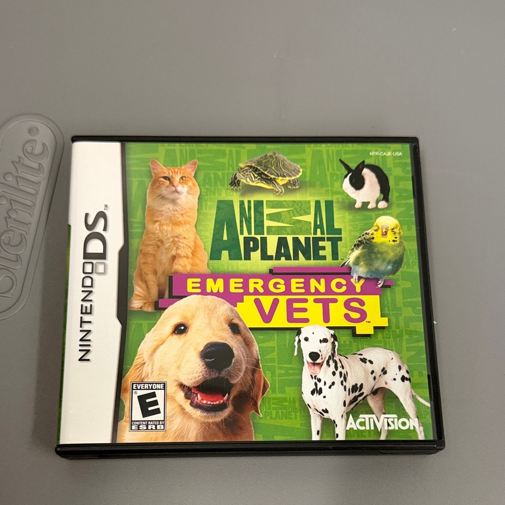 Nintendo DS Animal Planet Emergency Vets Game - Green and Purple